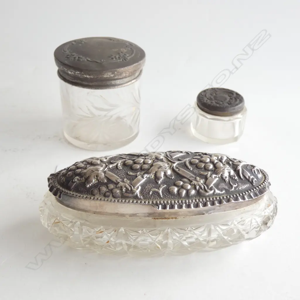 3 GLASS & STG SILVER LIDDED DRESSING TABLE JARS; 2 ROUND / 1 OVAL L. 125MM Image 1++