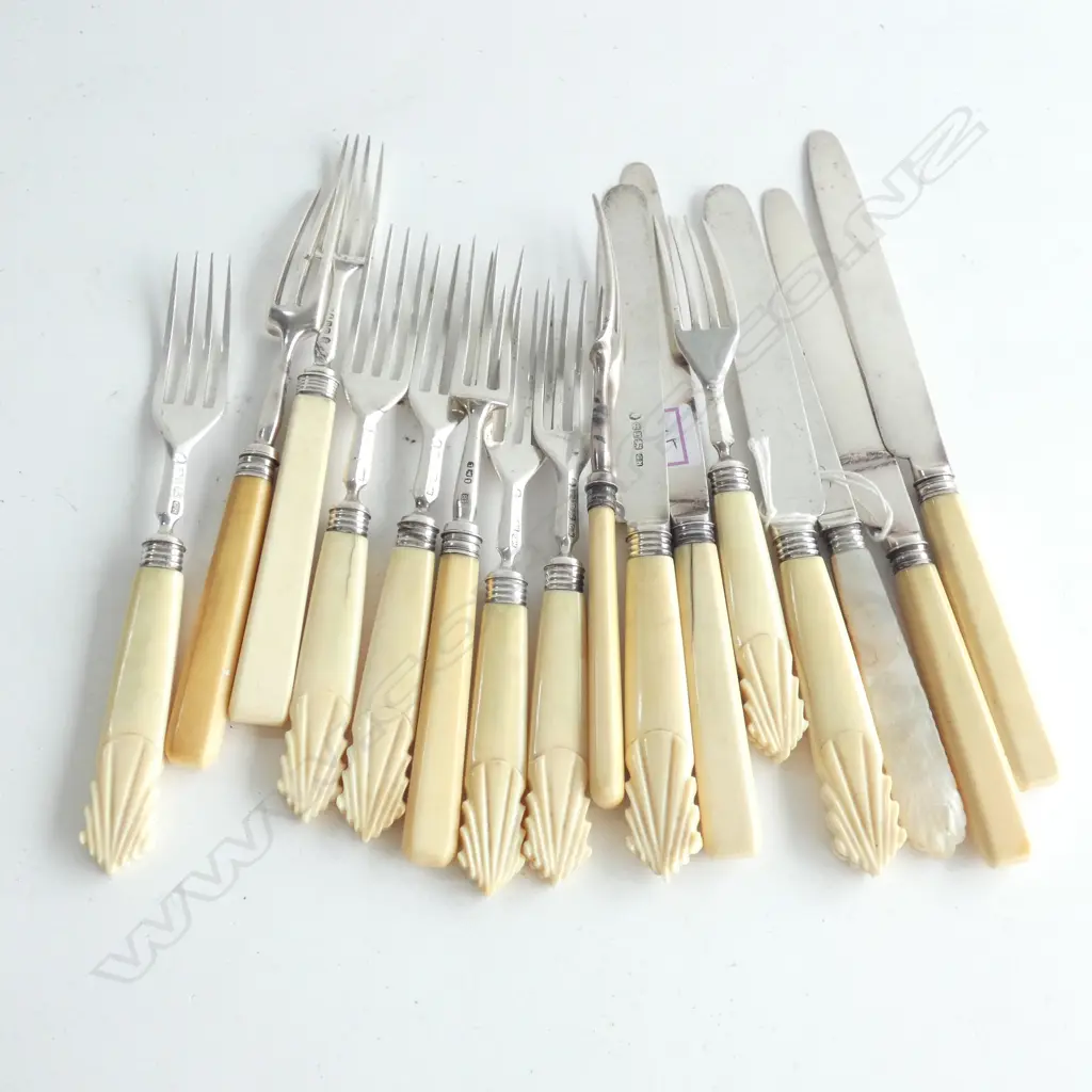 Two part silver and ivory handled fruit knife and fork sets Image 1++