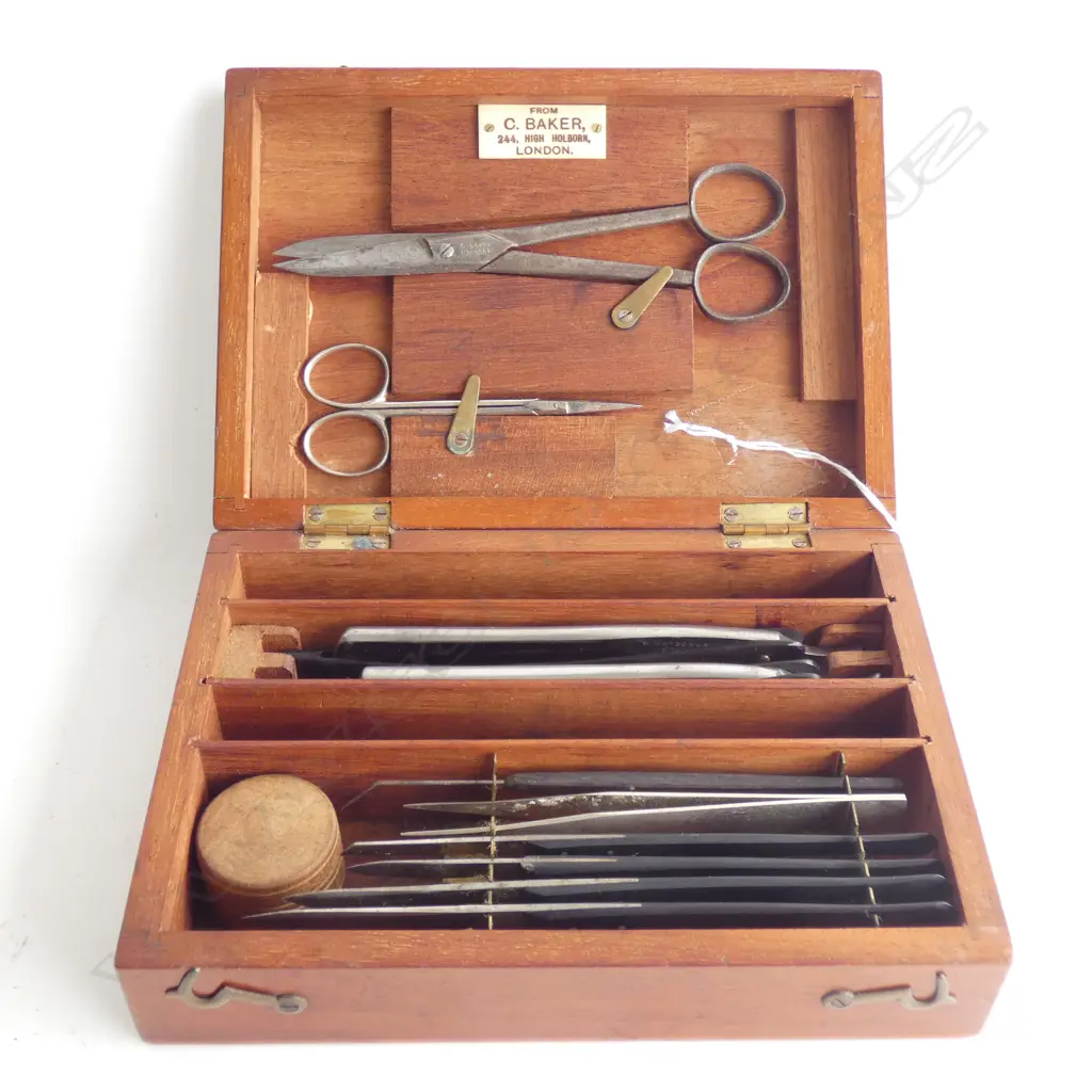 ENGLISH MEDICAL DISSECTING INSTRUMENTS IN A MAHOGANY BOX MARKED C BAKER, LONDON.  Image 1++