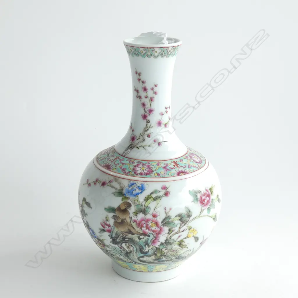 the design interrupted at the shoulder by a band of Bao Xiang Hua flowers Image 1++