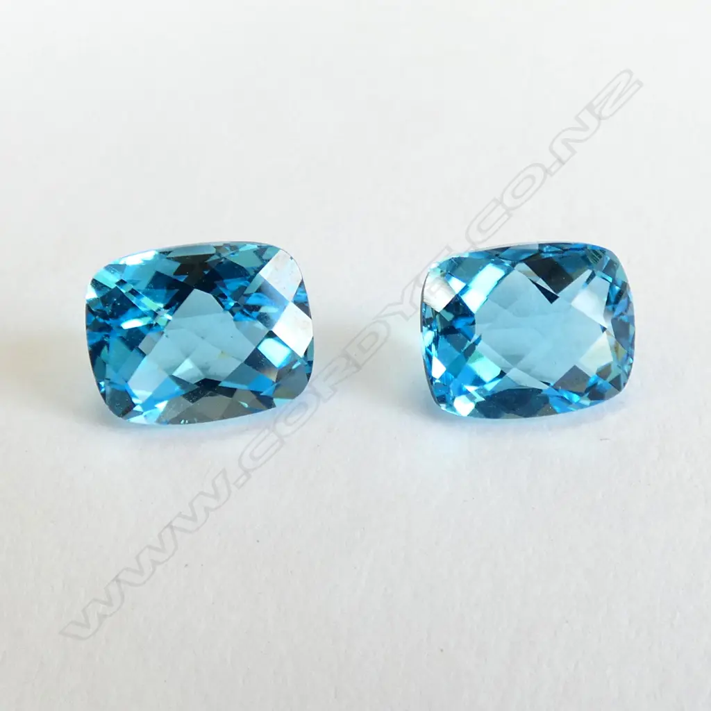 PAIR OF BLUE TOPAZ STONES - UNSET & CHEQUERBD CUT Image 1++