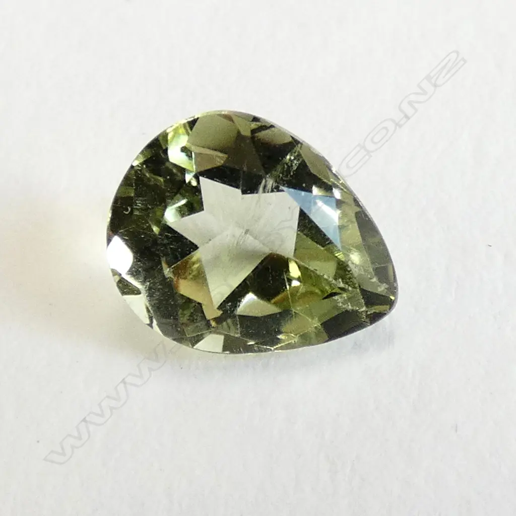 UNSET PERIDOT GEMSTONE - PEAR CUT Image 1++