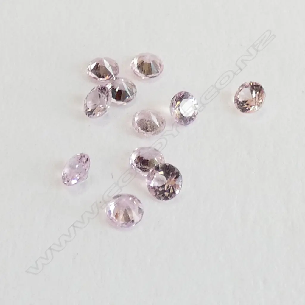 ELEVEN UNSET PINK SAPPHIRES  Image 1++