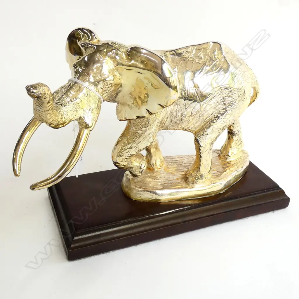 SILVER ELEPHANT ON WOODEN MOUNT - STAMPED D.G STERLING SILVER ... Image 1++