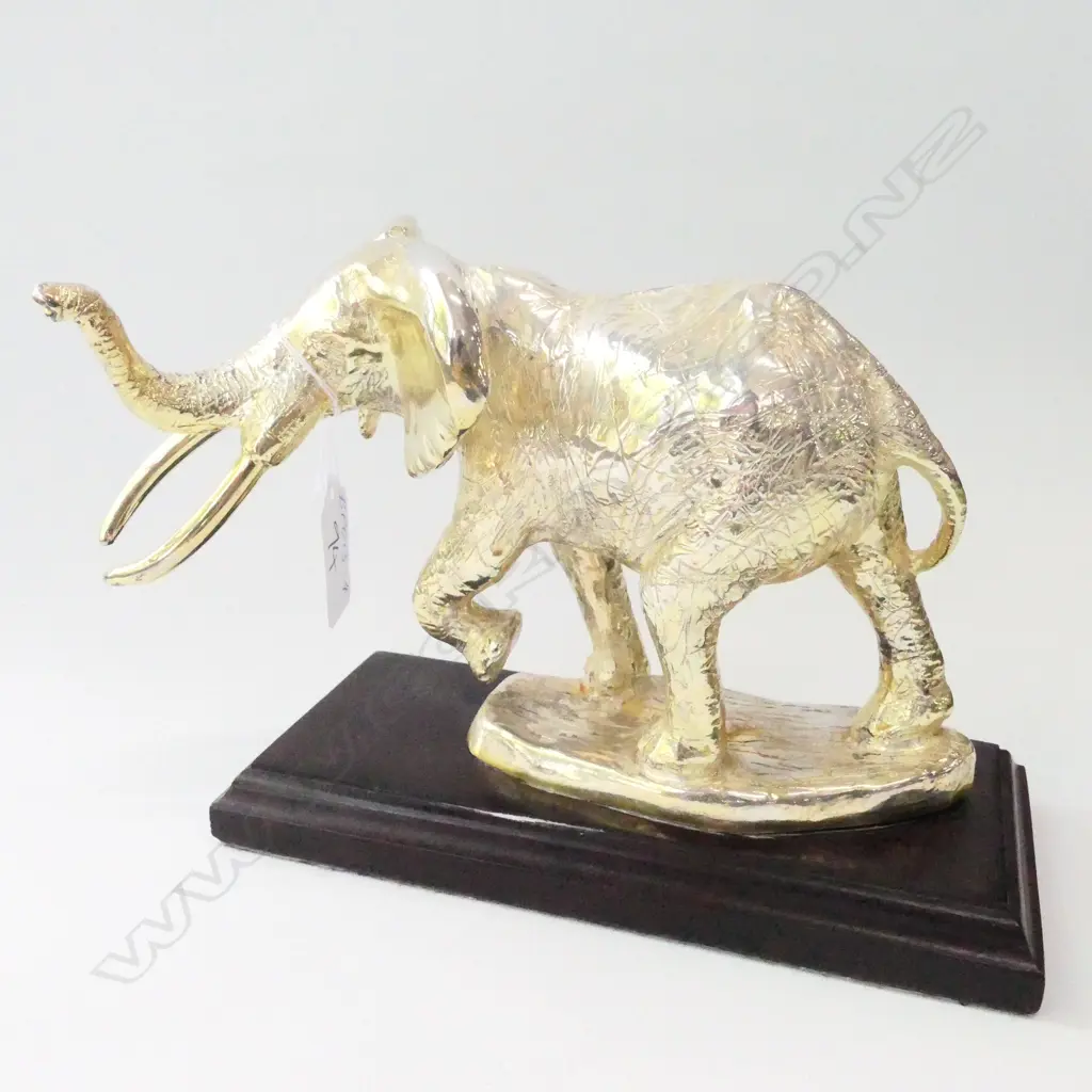 SILVER ELEPHANT ON WOODEN MOUNT - STAMPED D.G STERLING SILVER ... Image 1++