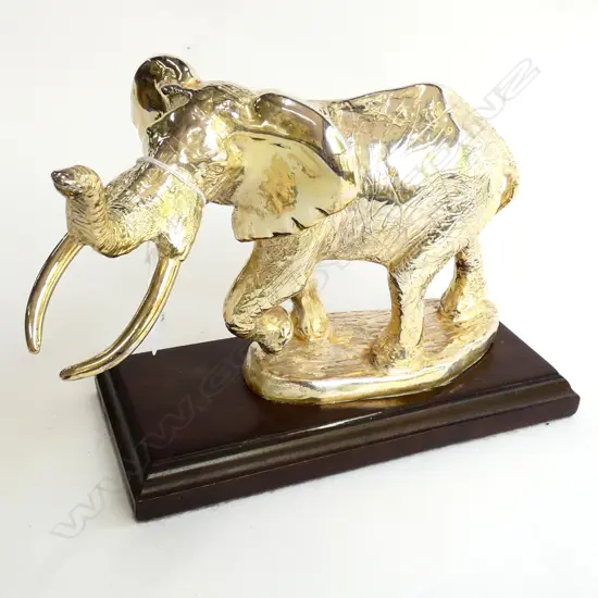 SILVER ELEPHANT ON WOODEN MOUNT - STAMPED D.G STERLING SILVER ...