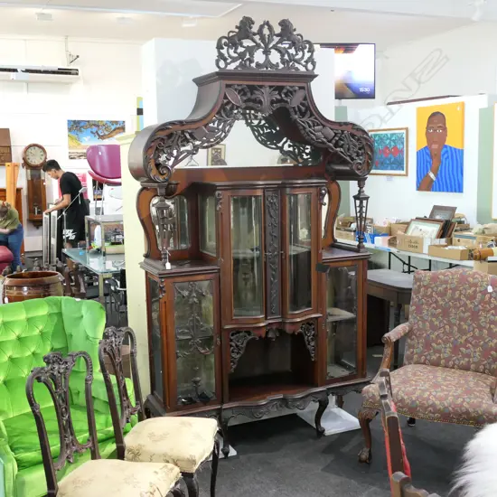 AN EDWARDIAN MIRROR BACKED DISPLAY CABINET H 2600 MM