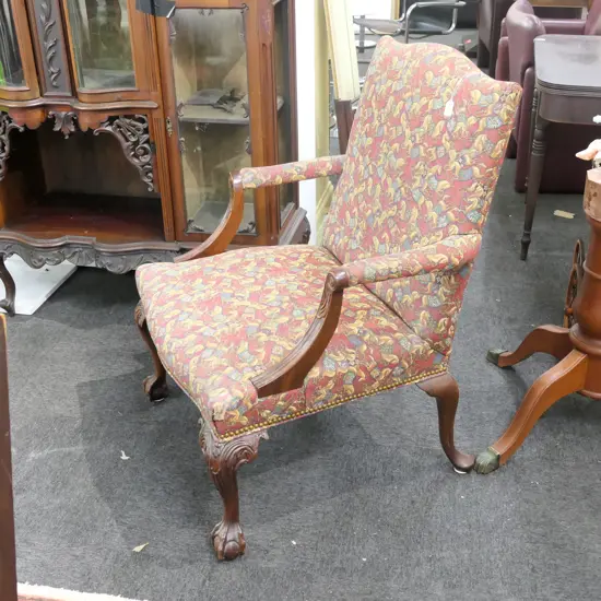 AN ANTIQUE GAINSBOROUGH ARMCHAIR