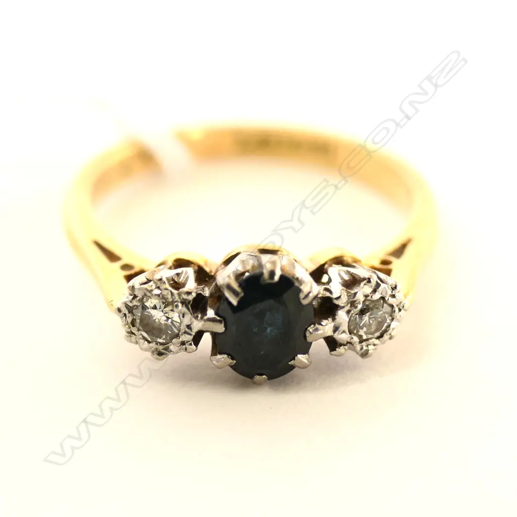 18CT GOLD SAPPHIRE AND DIAMOND RING Image 1++