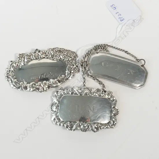 THREE SILVER DECANTER TICKETS (1 UNMARKED BUT TESTED)