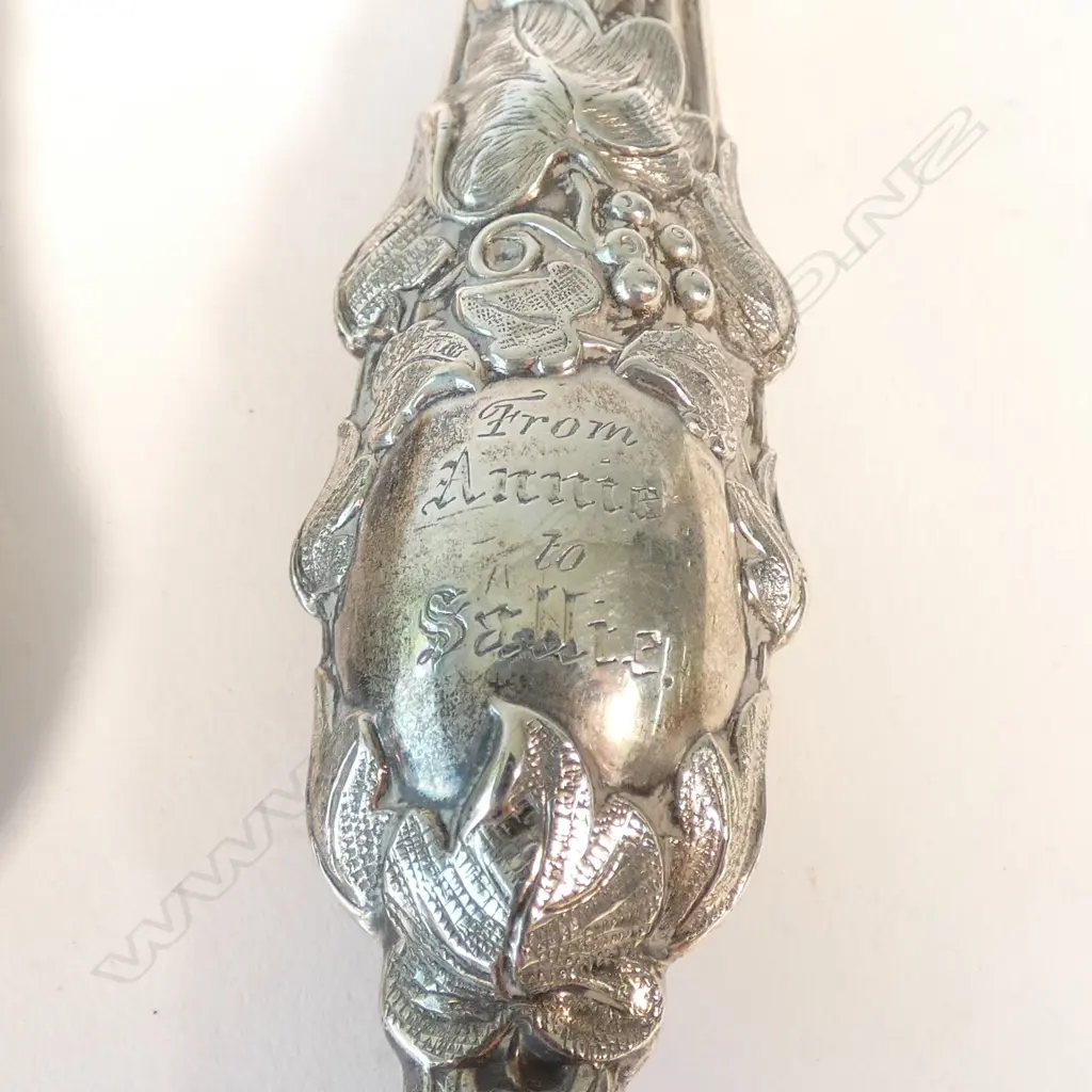 4 STG SILVER PCES; CLOTHES BRUSH, GLOVE HOOK, BUTTER KNIFE AND SHOE HORN Image 1++