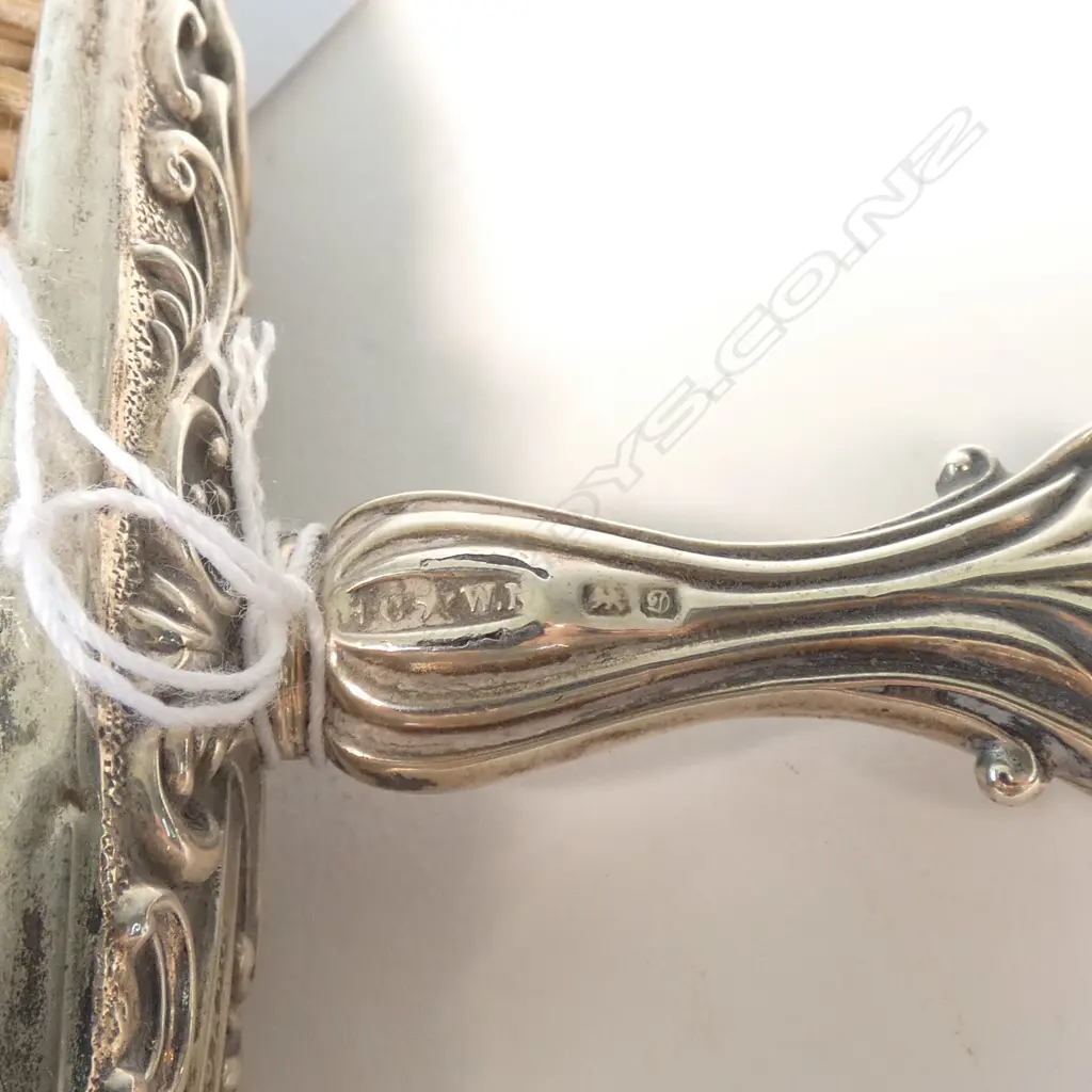 4 STG SILVER PCES; CLOTHES BRUSH, GLOVE HOOK, BUTTER KNIFE AND SHOE HORN Image 1++