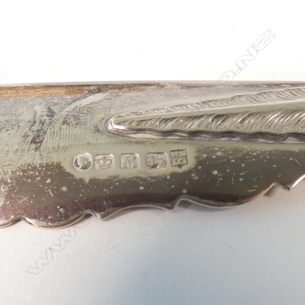 4 STG SILVER PCES; CLOTHES BRUSH, GLOVE HOOK, BUTTER KNIFE AND SHOE HORN Image 1++