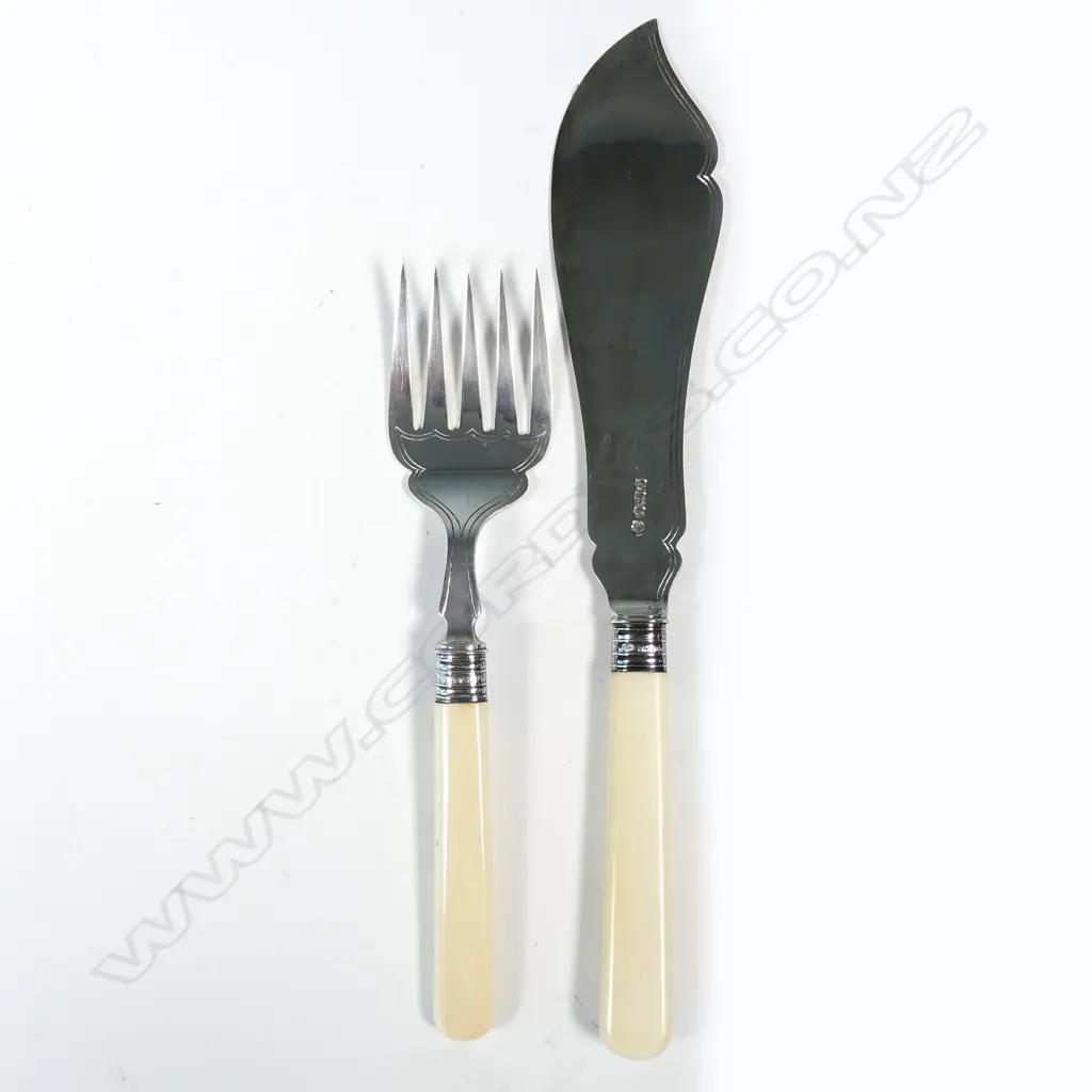 A pair of silver fish servers with ivory handles Image 1++