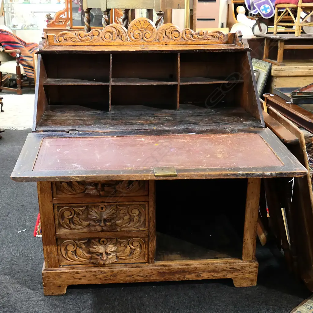 LATE VICTORIAN ORNATELY CARVED OAK FALL FRONT BUREAU, W. 910MM Image 1++