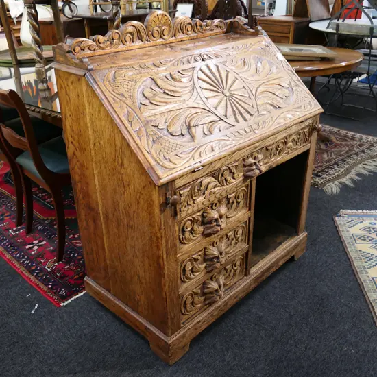 LATE VICTORIAN ORNATELY CARVED OAK FALL FRONT BUREAU, W. 910MM
