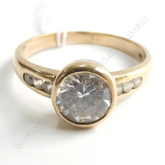 9CT YG  2CT?   CZ RING, SIZE S.  3.66GMS