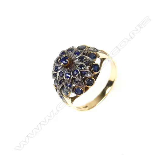 A vintage 14ct. yellow gold and multi-sapphire princess type cocktail ring