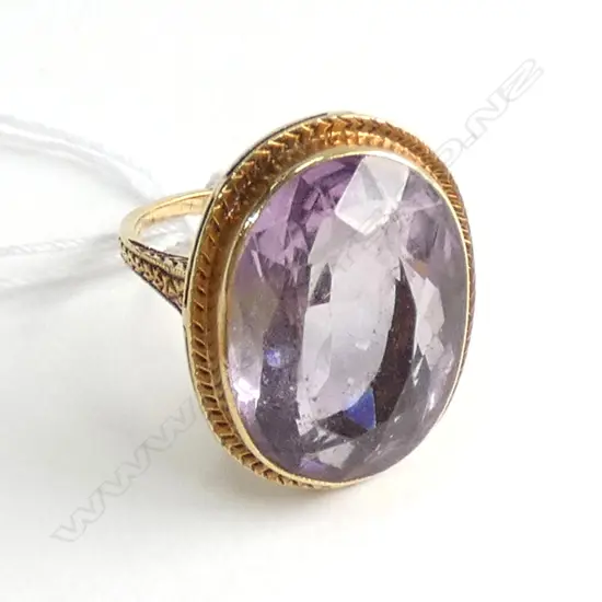 14K GOLD AND PURPLE AMYTHEST OVAL FACET CUT RING 