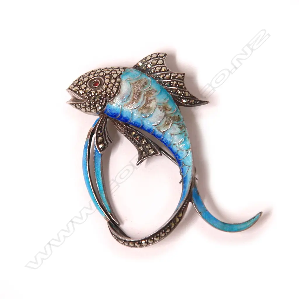A stylish vintage silver enamel and marcasite fish brooch Image 1++