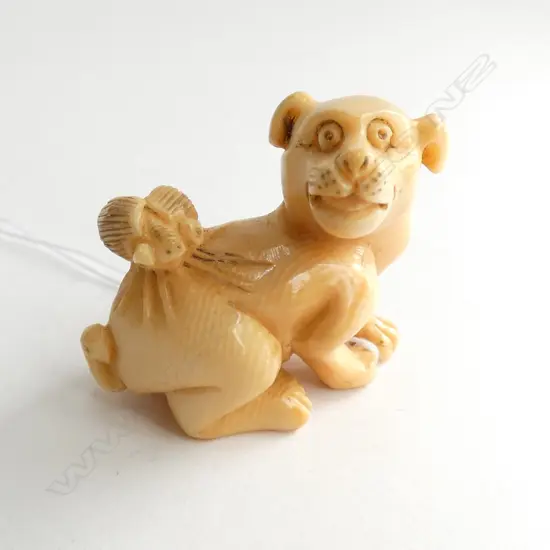JAPANESE CARVED IVORY NETSUKE DOG & INSECT...