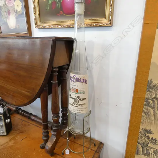 VINTAGE LRG GALLIANO BOTTLE ON STAND WITH TAP H. 880MM