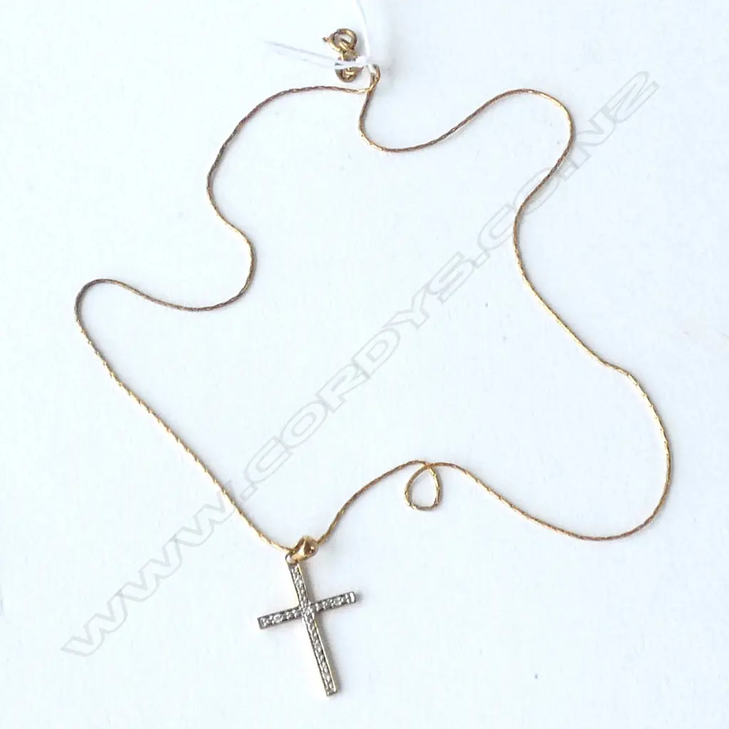 9CT GOLD DIAMOND SET CROSS ON SILVER CHAIN Image 1++