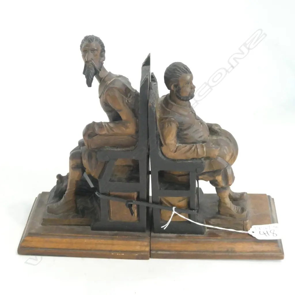 A PR OF VINTAGE HAND CARVED BOOKENDS Image 1++
