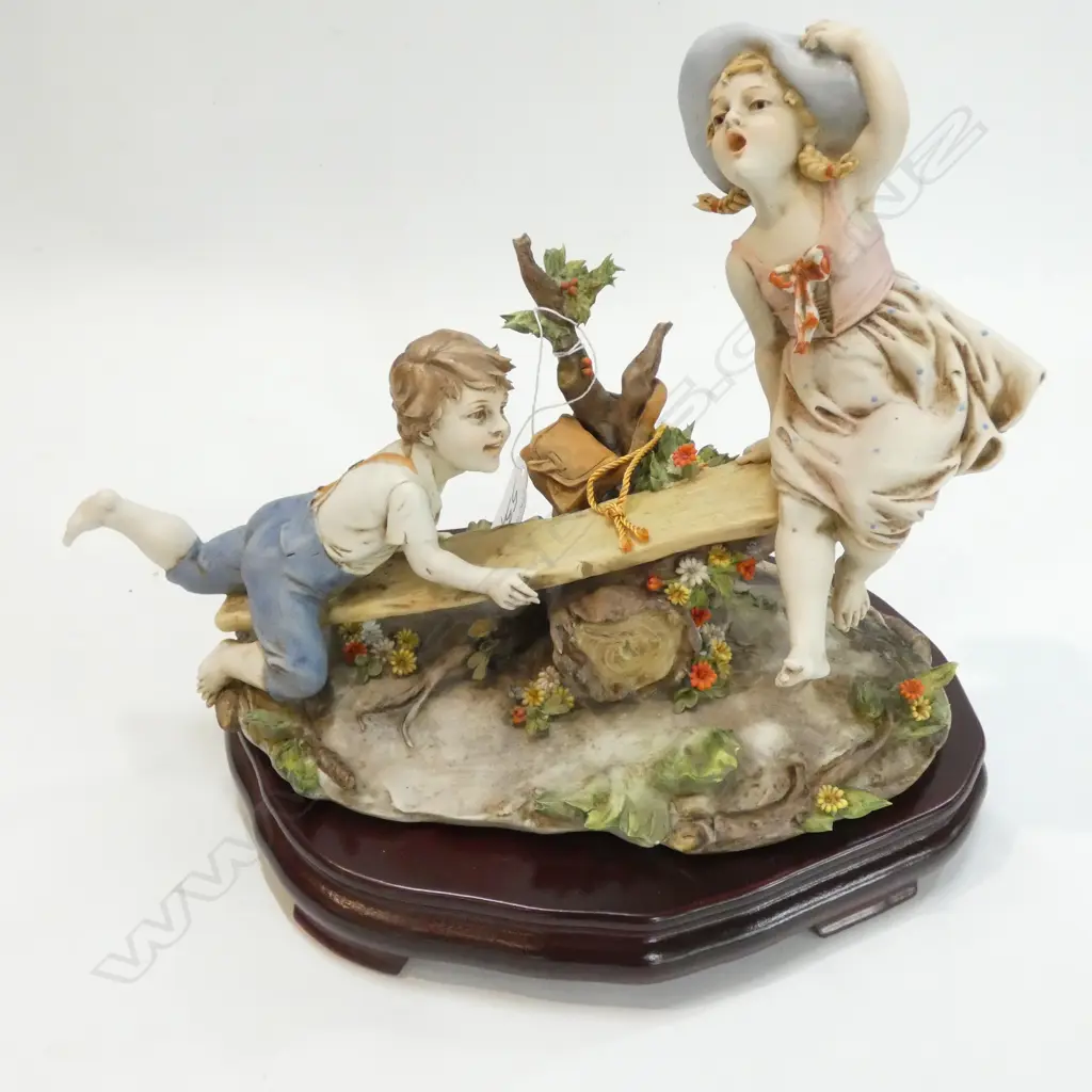 TRIADE FIGURE CHILDREN ON SEE SAW Image 1++