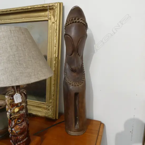 A PNG CARVED WOODEN BUST FIGURE 