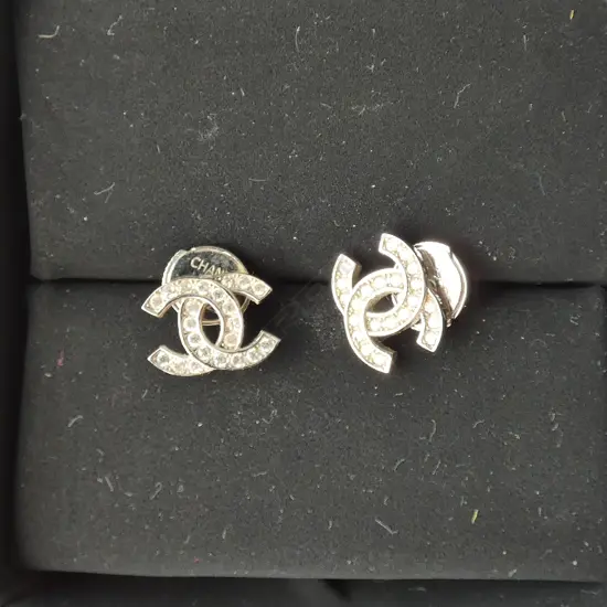 PAIR OF CHANEL SILVER & CZ STUD EARRINGS IN ORIGINAL BOX