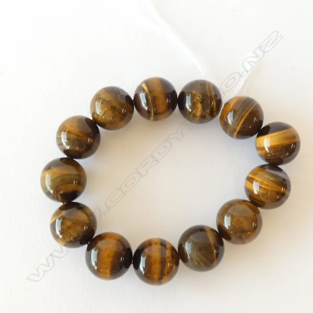 TIGERS EYE BRACELET 13 16MM BEADS Image 1++