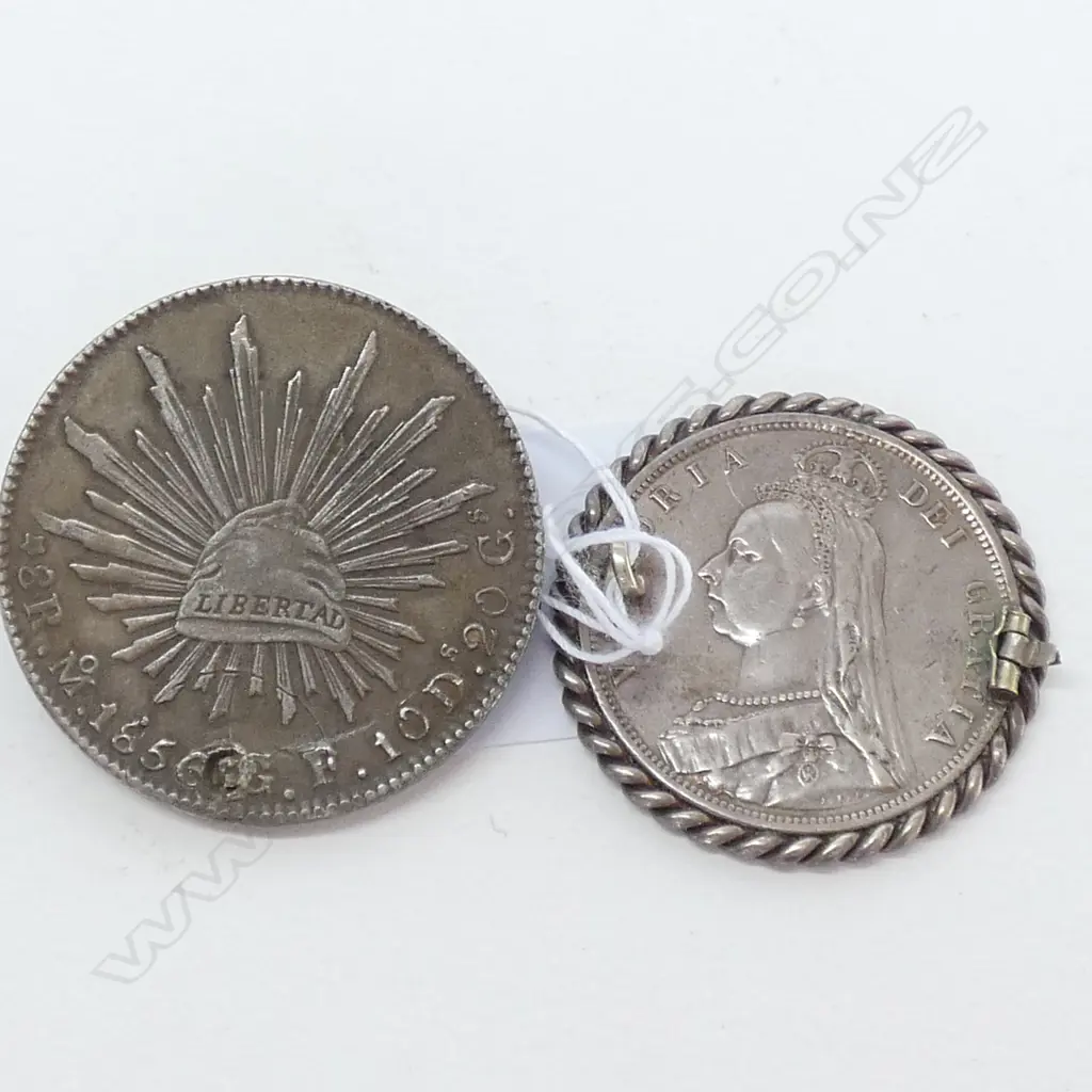 2 LARGE SILVER COINS ENGLAND AND MEXICO, IN MOUNTS Image 1++