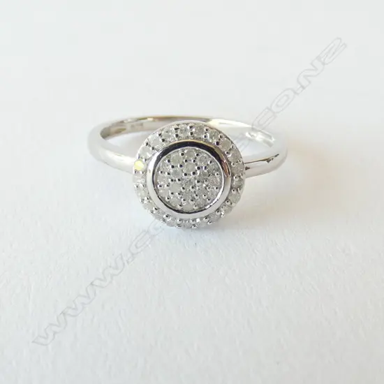 925 S/SILVER & .25CT DIAMOND RING. WITH VALUATION ($650)