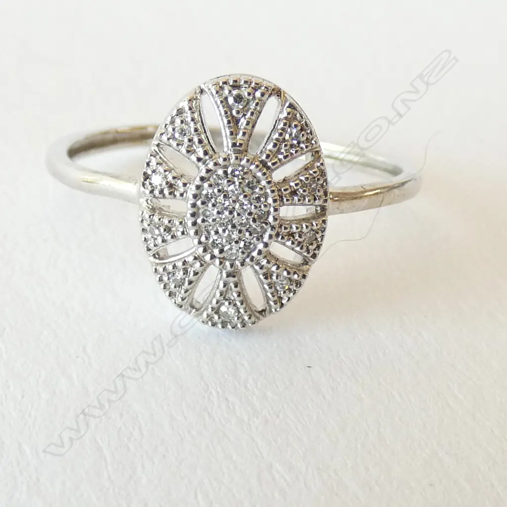 925 S/SILVER & .15CT DIAMOND RING Image 1++