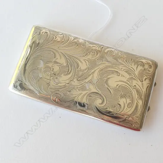 ORNATELY CARVED S/SILVER CIGERETTE CASE, STAMPED, 47GM, 85MM
