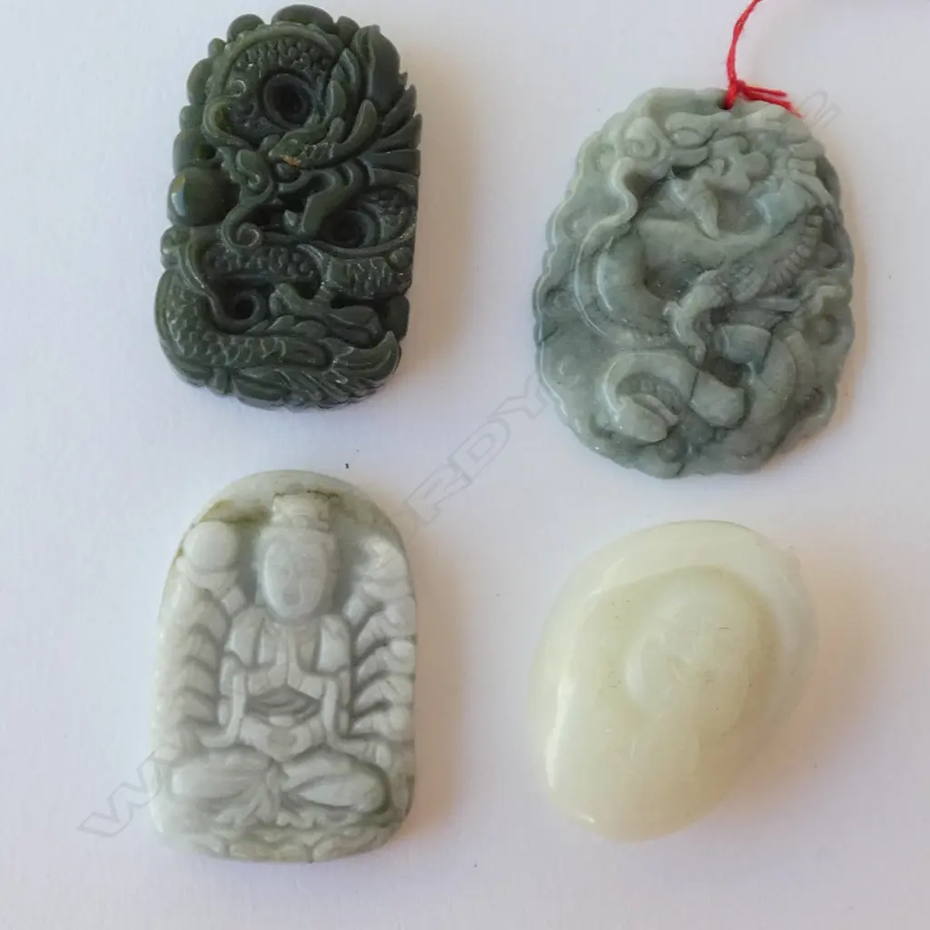 4 CHINESE STONE PENDANTS  Image 1++