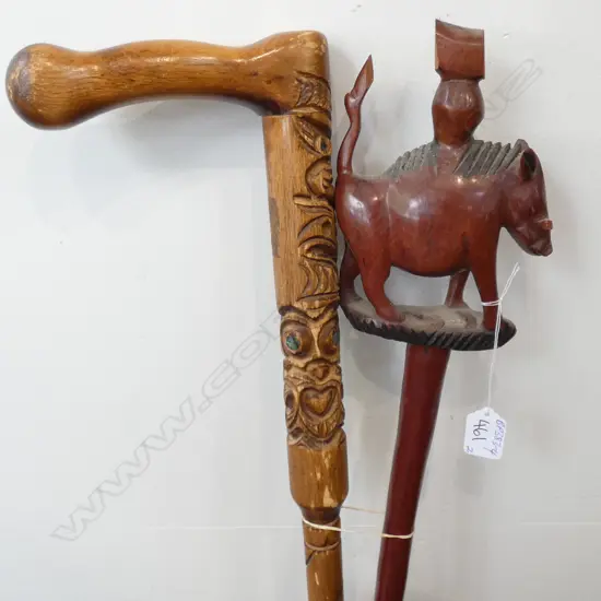 2 CARVED WALKING STICKS MAORI CARVED & BOAR A.F