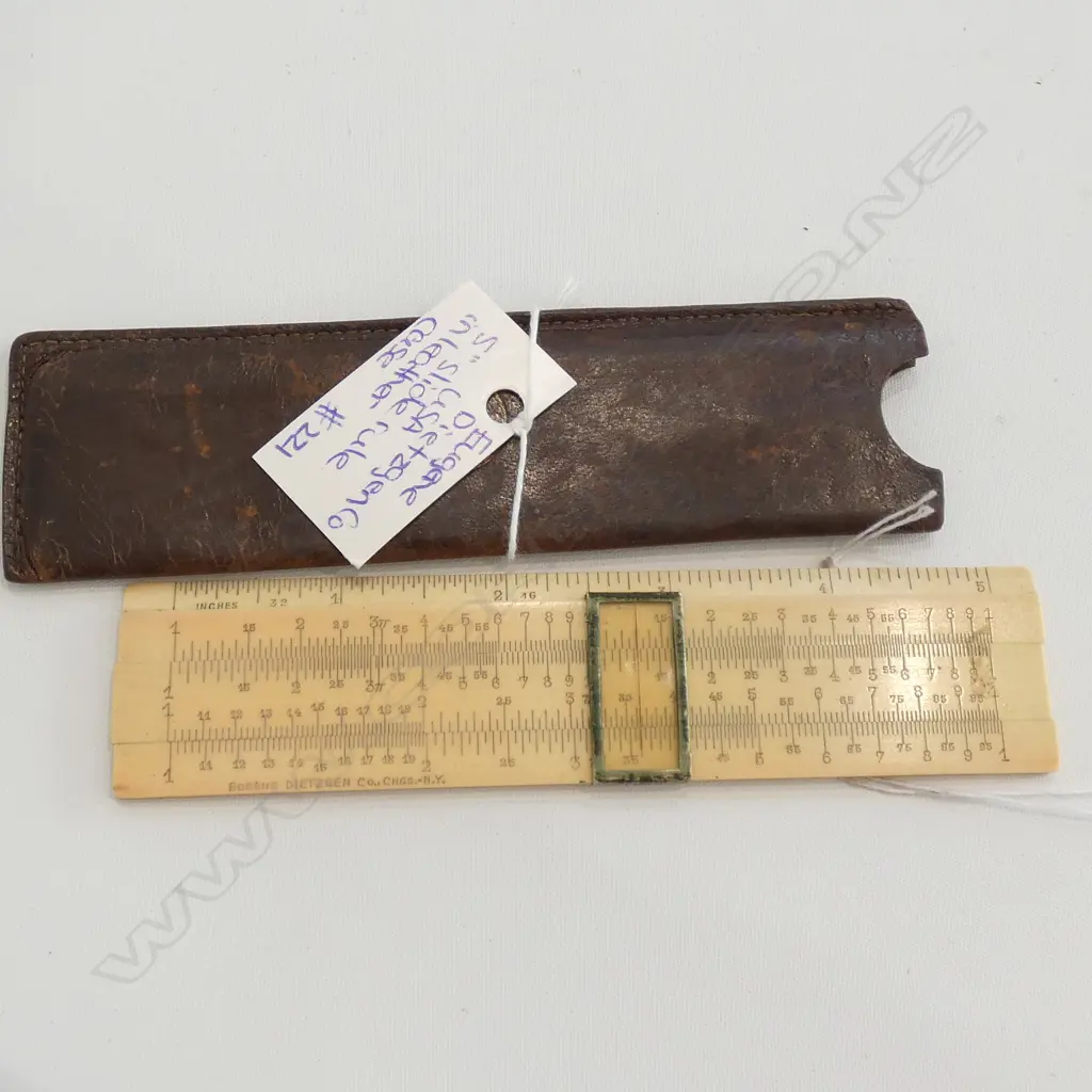 FAUX IVORY SLIDE RULE IN LEATHER CASE Image 1++