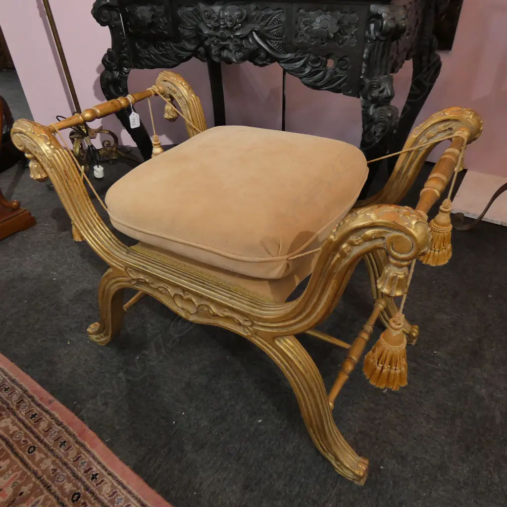 An ornate gilt curule stool Image 1++