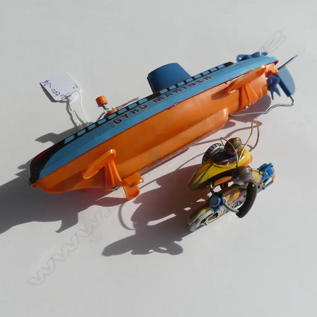 (3) 2 TOYS 1 PLASTIC ‘GYRO MARINER’ AND METAL GERMAN MOTORCYCLE AND SIDECAR Image 1++