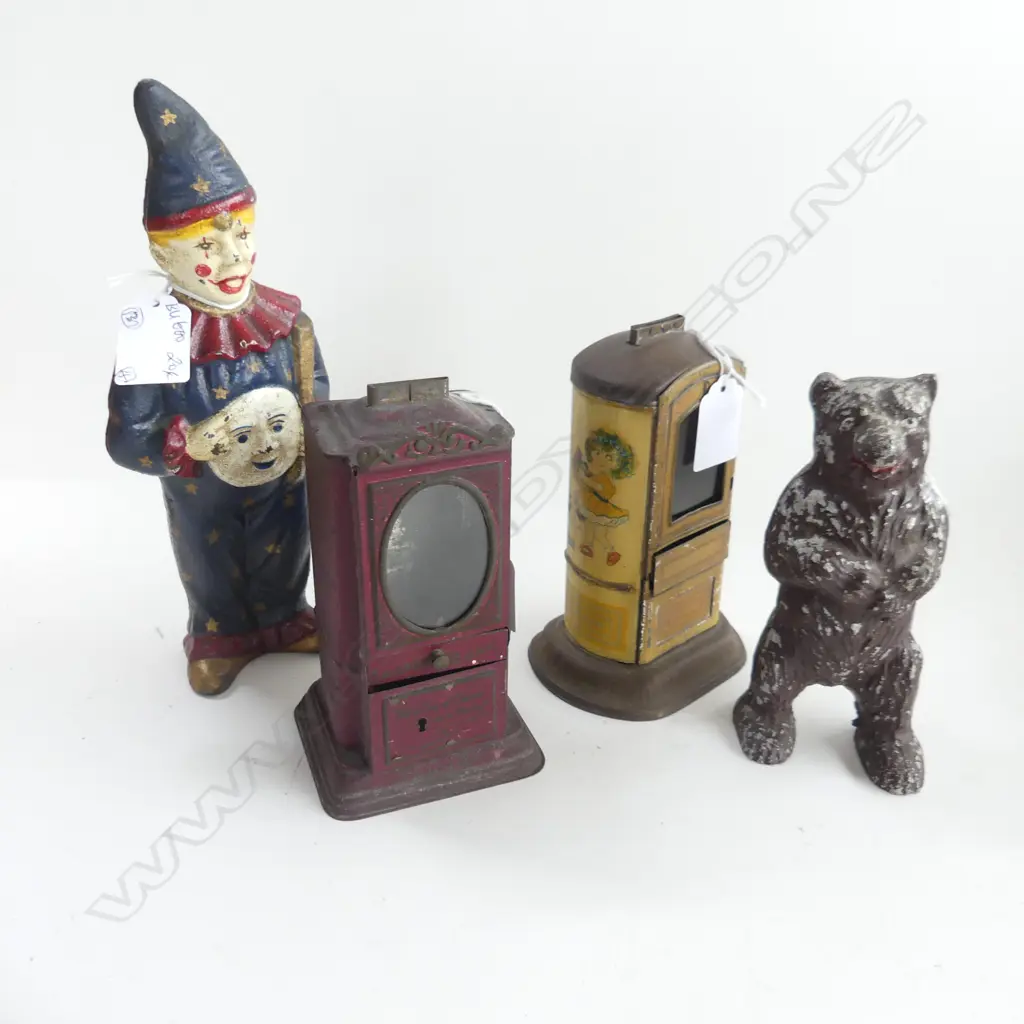 (9) 4 MONEY BOXES 1 CAST IRON REPRO CLOWN H. 240mm + 1 TIN PASCALS AMBROSIA  + 1 TIN WITH NURSERY FIGURES + 1 REPRO BEAR Image 1++