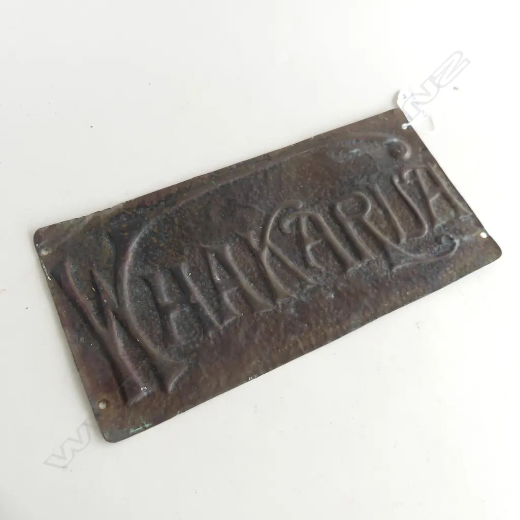 A COPPER SIGN 'WHAKARUA' IN NOUVEAU SCRIPT TRANSLATES TO 'NORTH EASTERLY BREEZE' H. 180 x 360mm Image 1++