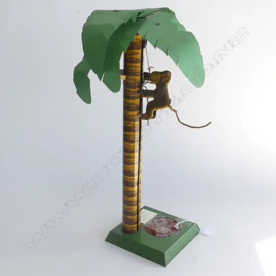 (82) TIN TOY MONKEY CLIMBS COCONUT PALM 460MM