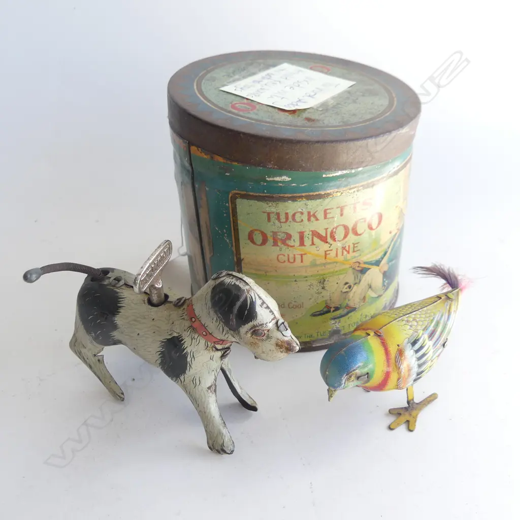 (82) TUCKETTS TOBACO TIN & 2 TIN TOYS DOG & BIRD Image 1++
