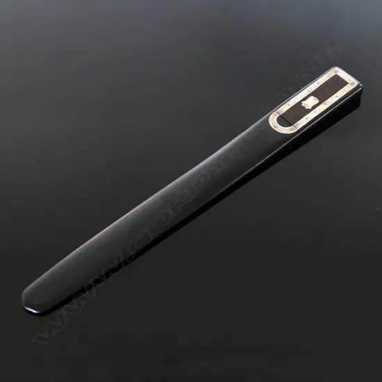 C1900 ebony Letter Opener or Paper Knife, with double stamp compartment.