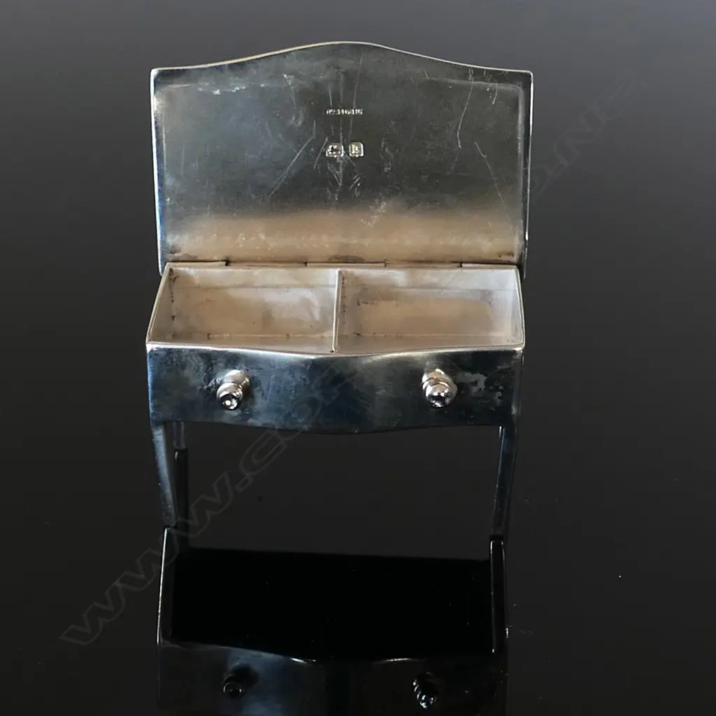An Edwardian silver miniature box modelled as a console table Image 1++