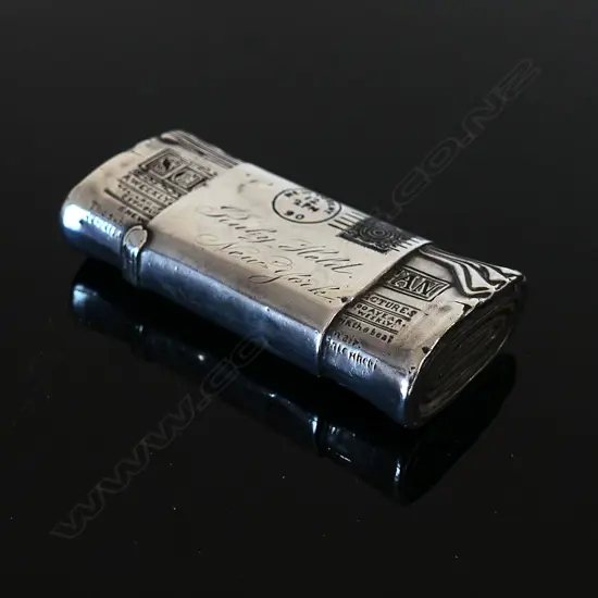 Late 19thC American Silver and enamel Vesta case shaped as a rolled copy of the Scientific American magazine