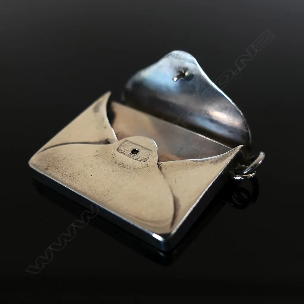 Marked “Sterling Silver”  (by the clip hole) Single Compartment Stamp Envelope. Image 1++