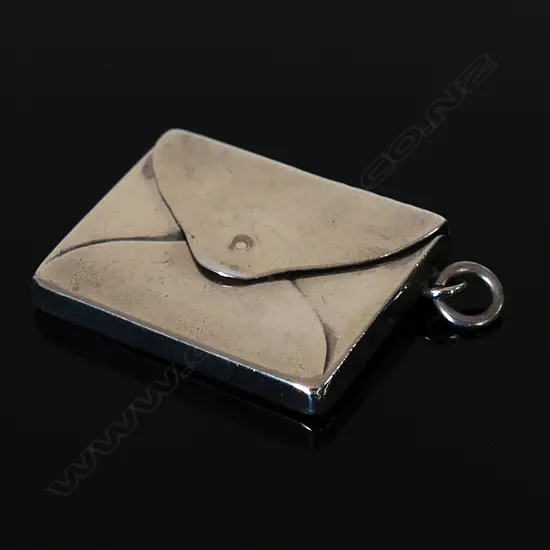 Marked “Sterling Silver”  (by the clip hole) Single Compartment Stamp Envelope.